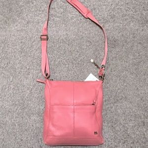 The Sak leather crossbody messenger bag coral salmon pink